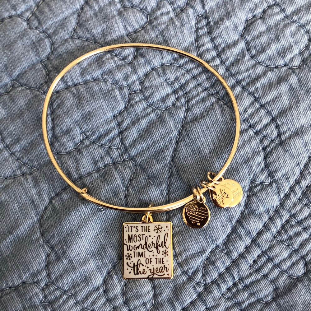 Alex and Ani shiny gold bracelet with Christmas themed charm